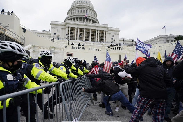 justice_department_broadens_trumps_jan_6_clemency_as_it_moves_to_drop_gun_cases