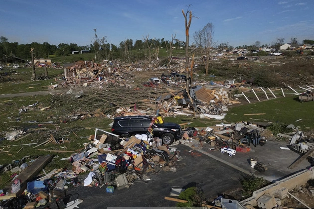 residents_dig_out_after_severe_storms_kill_27_in_kentucky_missouri_and_virginia