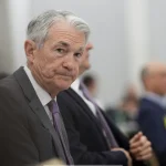 feds_powell_keeps_rates_where_they_are_defying_trump