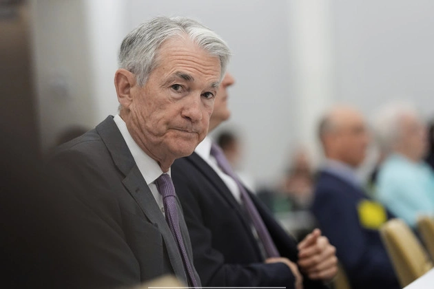 feds_powell_keeps_rates_where_they_are_defying_trump
